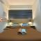 JC SpaceRentals 127B Amani Grand Resort Residences, balcony pool view, Ground floor, 5 mins frm airport, free wifi, Netflix