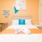 Sans Hotel at One JD Place Makati by RedDoorz