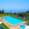 Studio Apartments with large swimming pool and Sea view at Pelekas Beach, Corfu