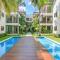 Playacar condo in complex w a gorgeous pool lounge