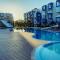 Superbe appartement au centre de Cabo Negro en résidence avec piscines et tobogans