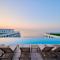 Vogue Sunrise View in Infinity Pool & Spa Resort