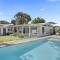 Heated Swimming Pool and Walk To Beach