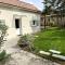 Petite maison avec jardin au calme