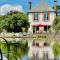 Le Moulin de Bury, Maison de campagne au bord de la rivière à 13 kms au Sud de Rennes