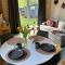 Tinyhouse Frida moderne & stilvolle Auszeit am See Natur & Ruhe in Stuer Mecklenburgische Seenplatte Klima, Grill
