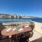 Blue Harbour Seafront Penthouse with large terrace with panoramic sea views - by Getawaysmalta