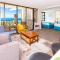 Waikiki Banyan condo - ocean views & beach access