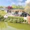 Prachtige vakantiewoning aan water met grote tuin
