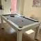 4 bedroom, sleeps 8, 30 seconds from beach, games table
