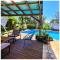 Ti case fleurie * Piscine * Jardin tropical