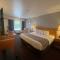 Garden Inn Homestead/Everglades/Gateway to Keys - Chambre Du Roi Supérieur