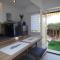 Studio moderne en rez de jardin