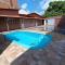 CASAS com PISCINA SENSACIONAIS NO CENTRO - Residencial Tchê