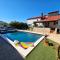 Villa Izziy Razanac -Zadar, by the beach with a sea view and heated pool