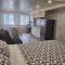 Modern studio with kitchenette and bath