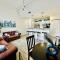 Two Bedroom Game Day Suite with 100 Projector TV