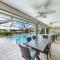 Honolulu East - Vacation home with heated pool and Gulf-access canal