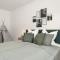Livesto Apartments im Zentrum Bad Driburgs - Modern, Parkplatz, Terrasse, Switch, SmartTV für Familien und B2B