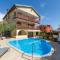 Family-friendly apartments with swimming pools Novigrad - 11242