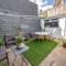 Lovely main door 1 bedroom holiday flat with patio