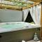 Chambre Cocoon dans une maison avec SPA et jardin en centre ville