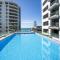 Superb Elevated Views of Harbour with Heated Pool, Gym & Parking