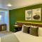 122 Plaza Apartahotel