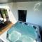 CARANTEC MAISON NEUVEJACUZZI JARDIN 8 personnes