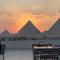 Pyramids Sun Land Veiw