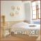 Logement 2 chambres lumineux, parking proche centre ville