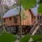 Unieke boomhutten met hot tub door Bed en Boshuisjes