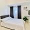 New Condo at Grand Riviera Suites across US Embassy