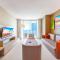 Stylish Condo Steps From the Beach!