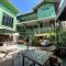 Green Teak House
