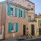 La maison aux volets bleus