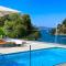 VILLA PHILIPPA - luxurious five-room villa - idyllic location - first row to the sea - spectacular view of the sea bay - unforgettable sunsets - 15 minutes from Supetar ferry port - free parking - private heated pool