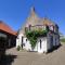 The cosy little house with the sundial
