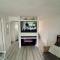 Norfolk Nest 2 bedroom chalet new media wall