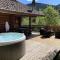 LE GRAND CERF Chalet en rondins avec SPA Jacuzzi