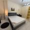 WELL FURNISHED ROOM sharing bathroom ONLY for COUPLE & FEMALE NEAR CORNICHE