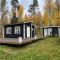 A simple stuga on a lake incinerating toilet in a separate building next to the cabin Water for drinking and washing hands dishes comes from two containers that attach to a faucet through a simple electric pump OBS no shower on site