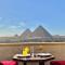 PYRAMIDS TOWER Inn