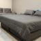 Patong Vacation Rentals - Located in the Heart of Patong, Studio Apartments walking distance to the beach, King Bed, Kitchen, Private Bathroom, Seating Area, 65" Smart TV with Free WIFI