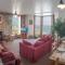 HUER'S WATCH a beautifully presented PRIVATE APARTMENT with far reaching VIEWS Over ST IVES HARBOUR and BAY and FREE ONSITE PARKING for LARGER GROUPS book along with our Connecting TWO SISTER APARTMENTS