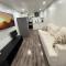 Modern & cozy one Bedroom Basement Suite with Kitchen and parking- sleeps 4