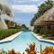 Aqua Zensa, luxe appartement 2 min van Mambo Beach