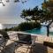 Villa Nettuno panoramic pool villa with patio above the sea