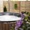 Kominkowy Chill - Jacuzzi, Sauny & Wybrane apartamenty z prywatnym jacuzzi