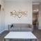 Double Play Wrigley - Prime Location Across from Wrigley Field & Transit - 2BR Apts